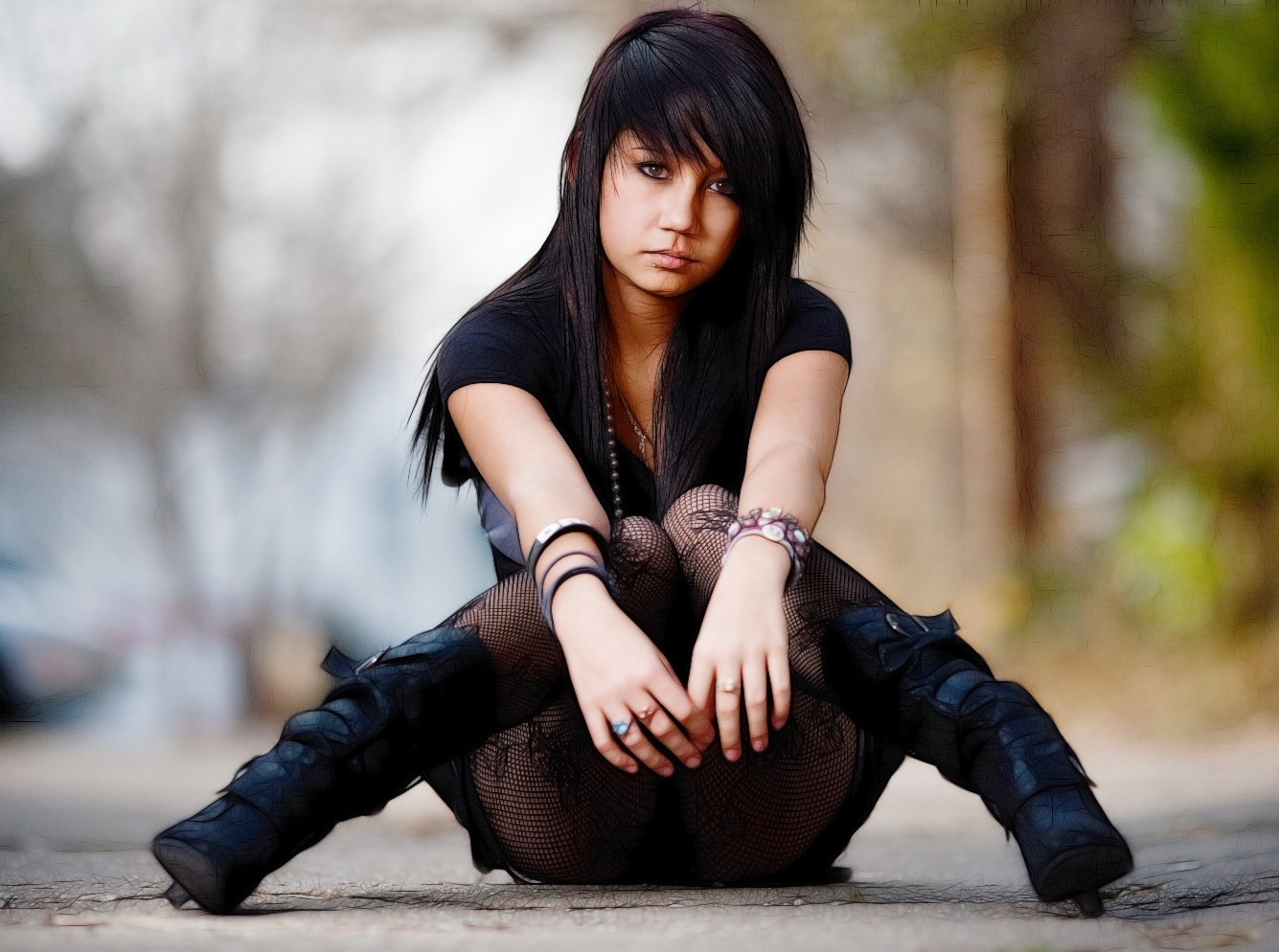 Brunette Gothic Girl wearing Black Fishnet Pantyhose and Black Boots